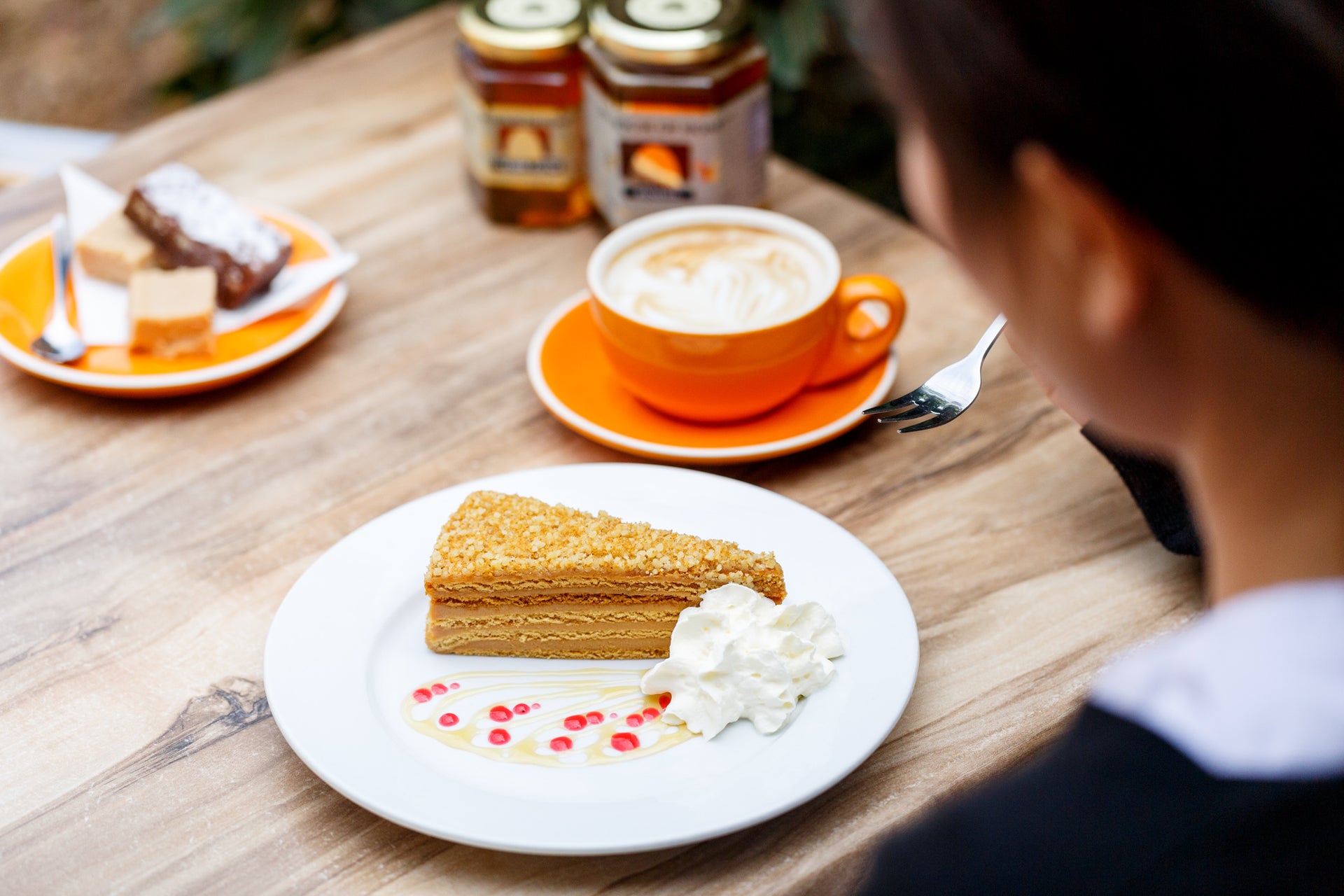 Table with honey cake and coffee